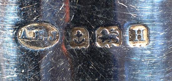 A George V Arts & Crafts silver three piece condiment set,